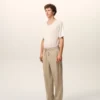 Pantalones de algodón beige con cintura elástica
