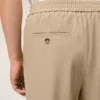 Pantalones de lana beige con cintura elástica