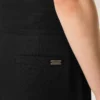 Pantalones negros de lana nueva con cinturón cruzado