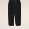 Pantalones oversize de corte zanahoria de algodón negro