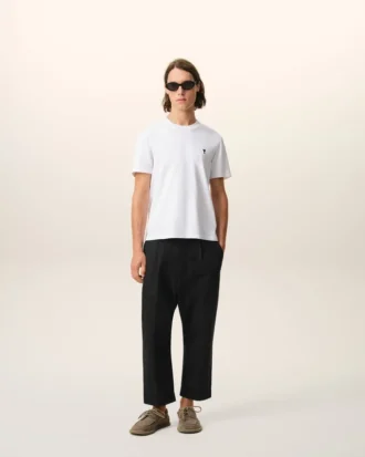 Pantalones oversize de corte zanahoria de algodón negro