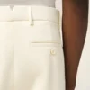 Pantalones rectos de lana blancos