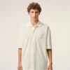 Polo de algodón blanco con parche de punto Ami de Coeur