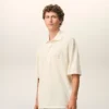 Polo de algodón blanco con parche de punto Ami de Coeur