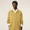 Polo de manga larga de lana amarilla