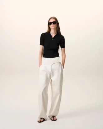 Polo de punto negro de manga corta