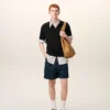 Polo de punto negro de manga corta