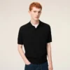 Polo de punto negro de manga corta