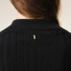 Polo de punto negro de manga corta Polo de punto negro de manga corta