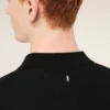 Polo de punto negro de manga corta