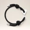 Pulsera Ami de Coeur de cordón negro y latón plateado
