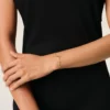 Pulsera de cadena Ami de Coeur de latón dorado