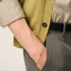 Pulsera fina martillada Ami de Coeur de latón dorado
