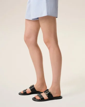 Sandalias con hebilla de piel de vaca negra