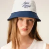 Sombrero Ami Paris de algodón azul y blanco