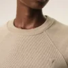 Sudadera «Ami de Coeur» de algodón beige con relieve Sudadera «Ami de Coeur» de algodón beige con relieve