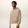 Sudadera con capucha y cremallera Ami de Coeur en algodón beige con relieve Sudadera con capucha y cremallera Ami de Coeur en algodón beige con relieve