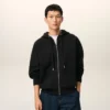 Sudadera con capucha y cremallera Ami de Coeur en algodón negro con relieve Sudadera con capucha y cremallera Ami de Coeur en algodón negro con relieve