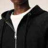 Sudadera con capucha y cremallera Ami de Coeur en algodón negro con relieve Sudadera con capucha y cremallera Ami de Coeur en algodón negro con relieve