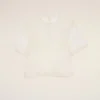 Top de seda blanco de manga corta transparente con top interior