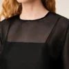 Top negro de seda de manga corta transparente con top interior Top negro de seda de manga corta transparente con top interior
