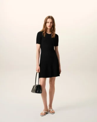 Vestido mini con godets de punto negro