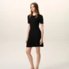 Vestido mini con godets de punto negro