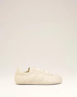 Zapatillas blandas de piel de vaca blanca