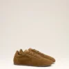Zapatillas deportivas blandas de piel de vaca marrón Zapatillas deportivas blandas de piel de vaca marrón