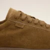 Zapatillas deportivas blandas de piel de vaca marrón Zapatillas deportivas blandas de piel de vaca marrón