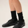 Zapatillas deportivas de piel de vaca negra Zapatillas deportivas de piel de vaca negra