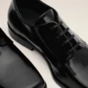 Zapatos derby de piel de vaca negra Zapatos derby de piel de vaca negra